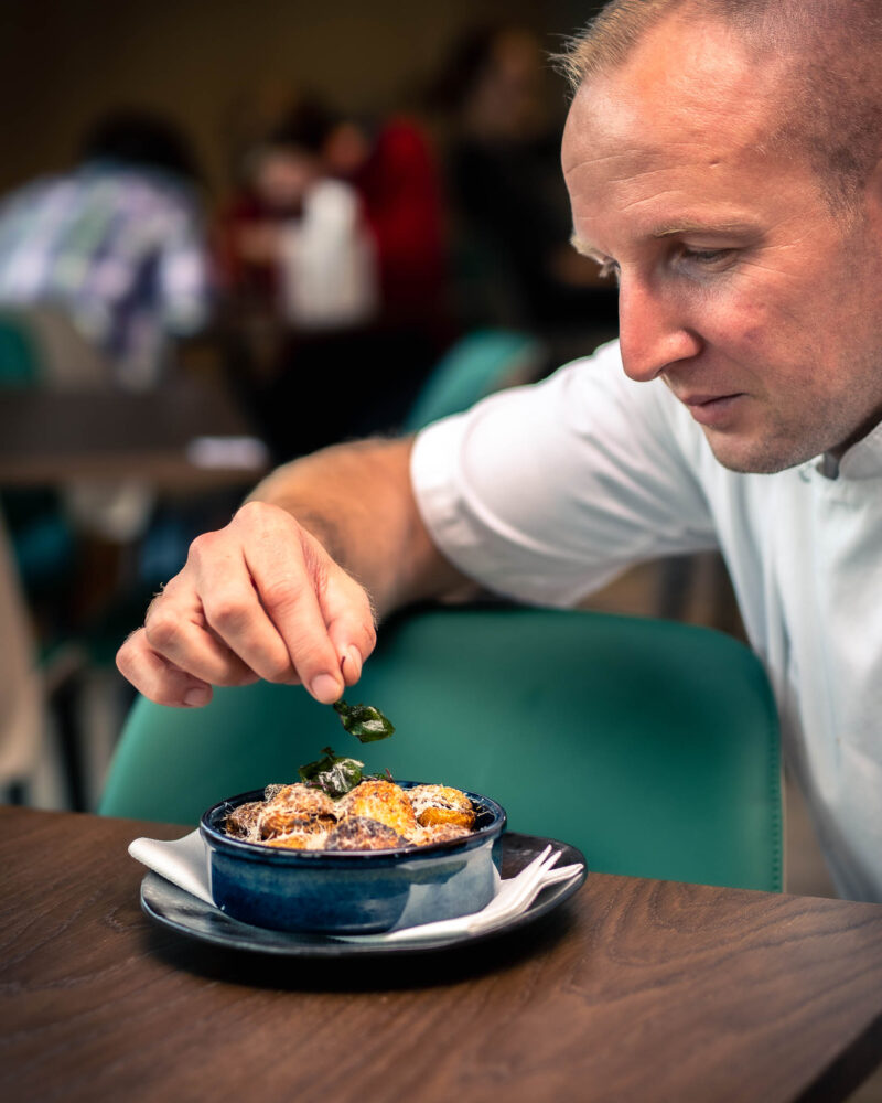 Man tasting food at W Cafe & Bar